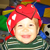 baby with heart hat