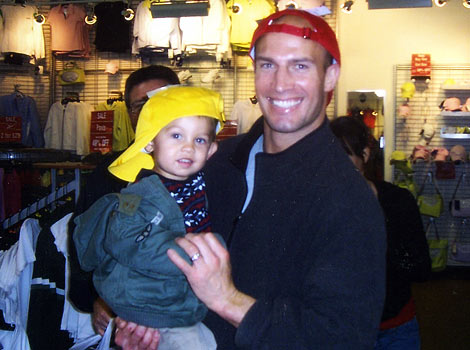 Eric and child with hats on