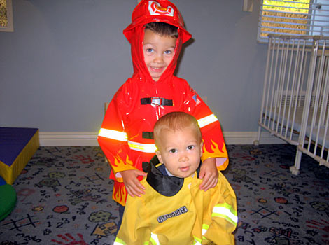 boys dressing up like firefighter Karl