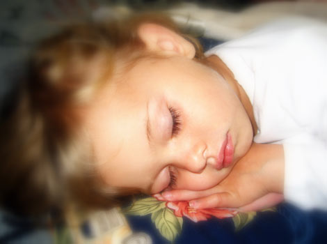 little girl asleep like an angel