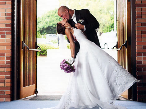 Eric and Jamie Watson kissing after getting married